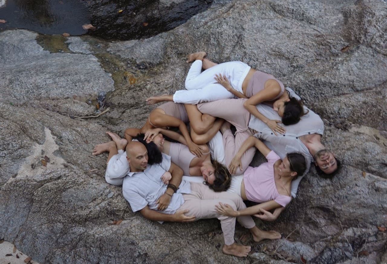 People resting together in a shared movement practice